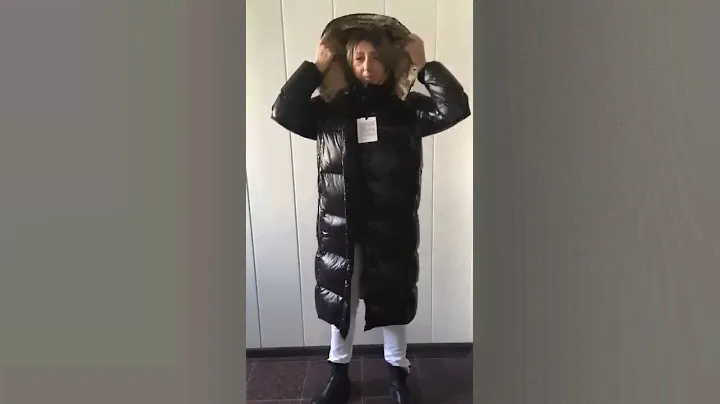Black long down puffy coat with a hood. Moncler long down jacket.  Длинный пуховик Moncler.